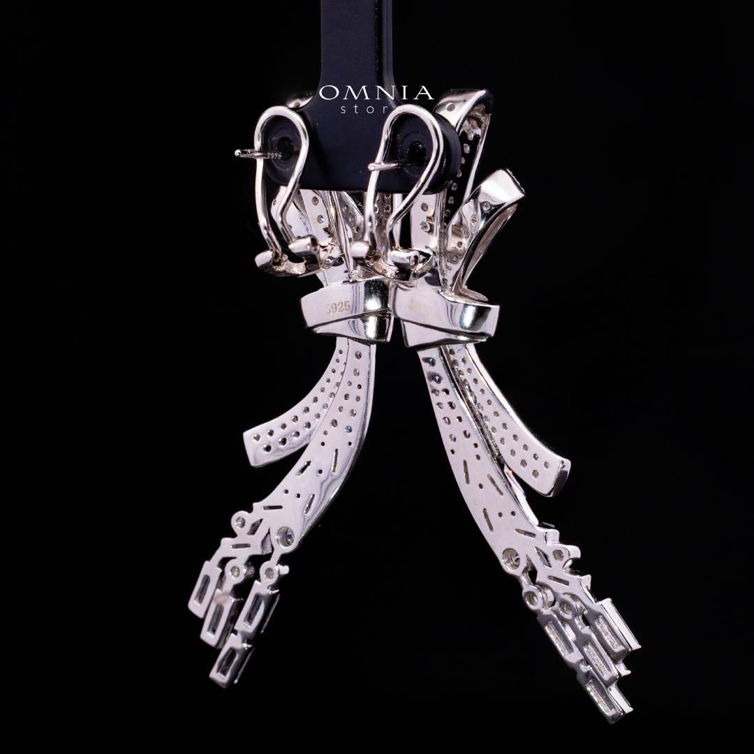 Omnia Celeste Bow Design Earrings in 925 Silver with High-Quality Simulated Diamonds and Elegant Dangling Accents - Image 3