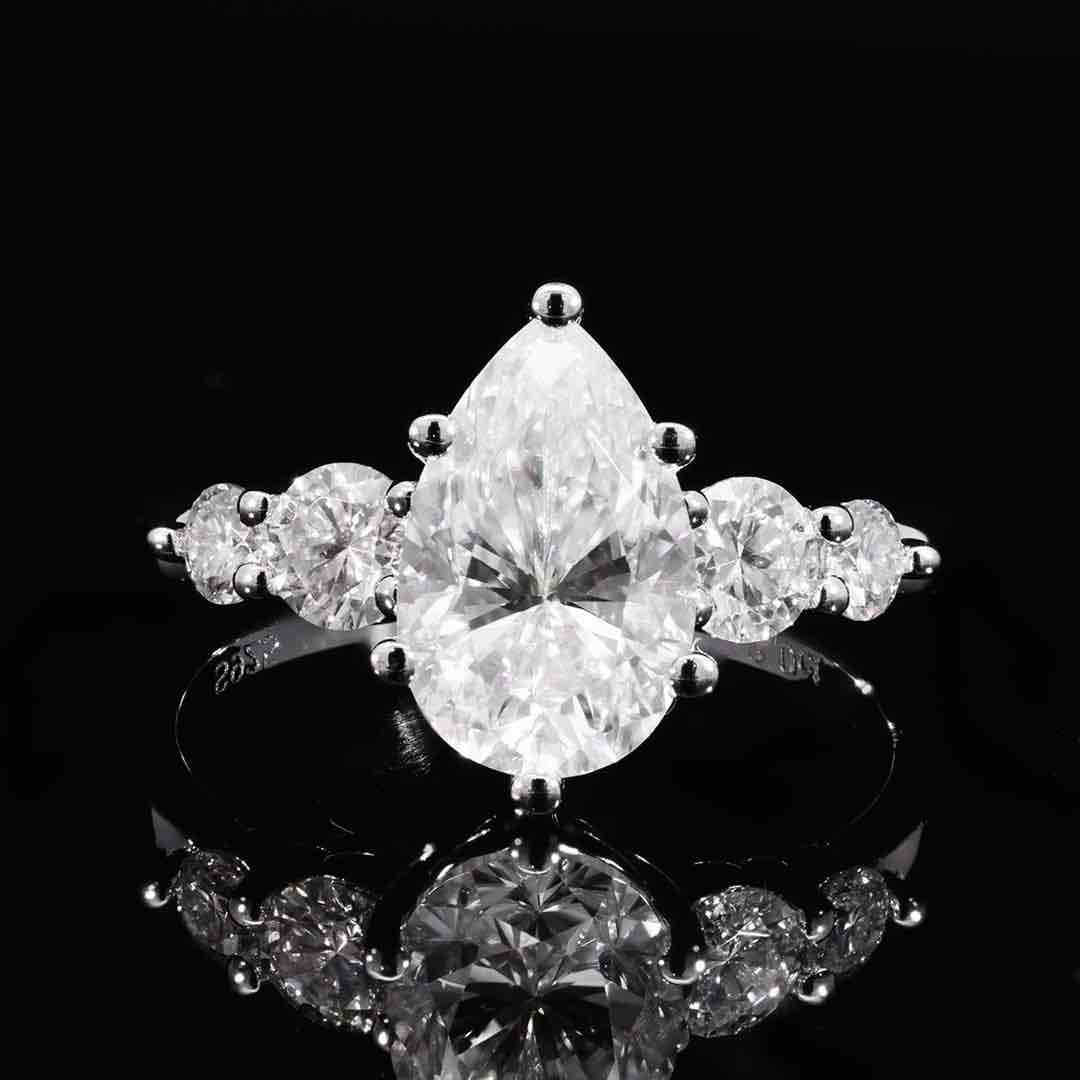 Omnia Hakima White Moissanite Ring – Certified 925 Sterling Silver Pear Cut