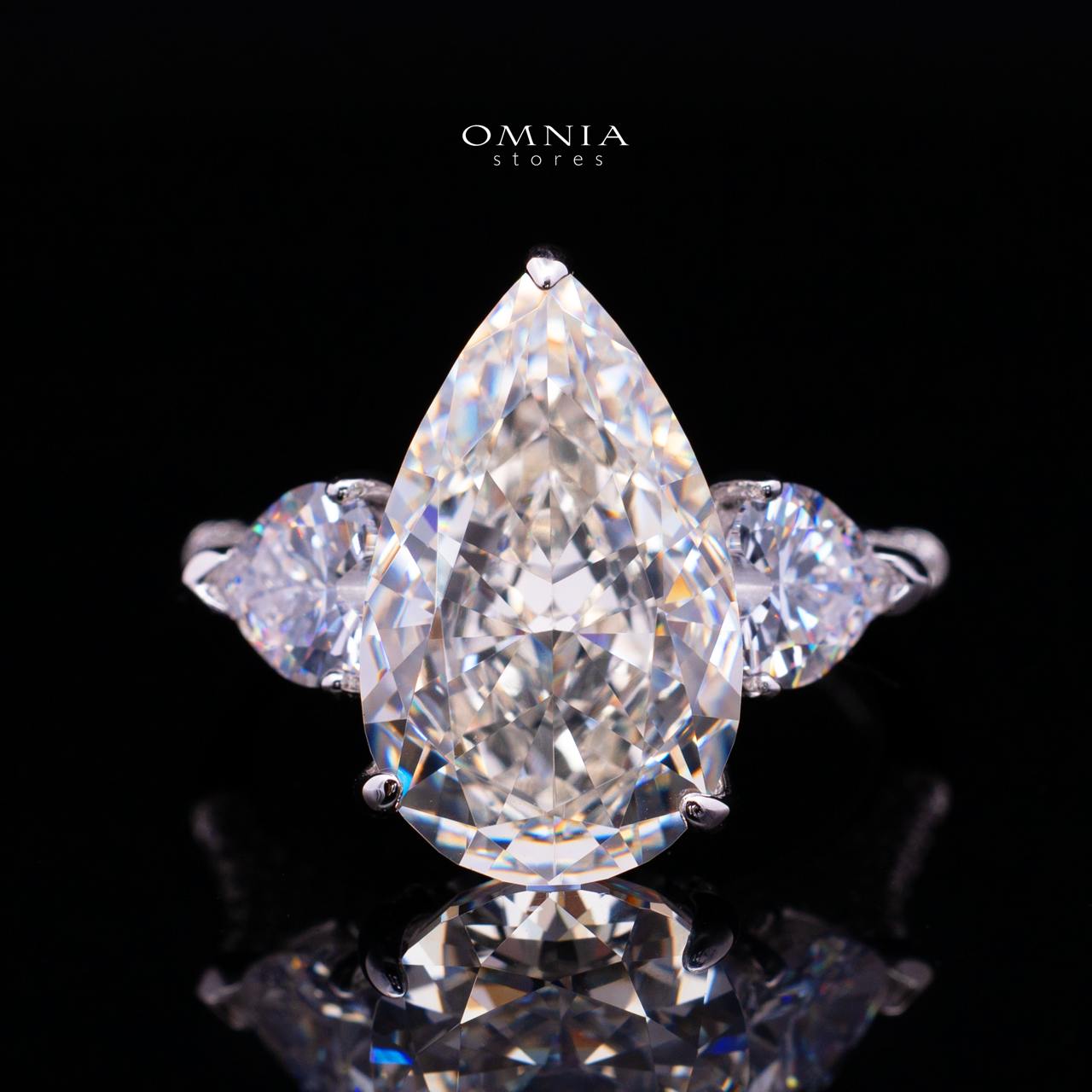 Maxene White Pear-Cut Solitaire Ring in 925 Silver with Premium Simulated diamond